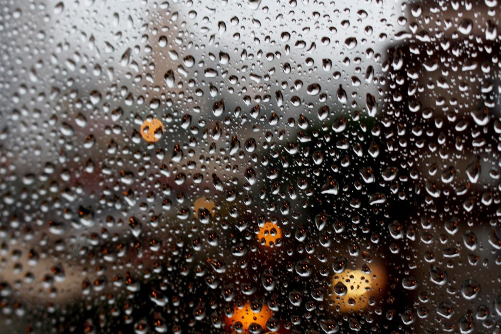 Rainwater collecting on a window pane